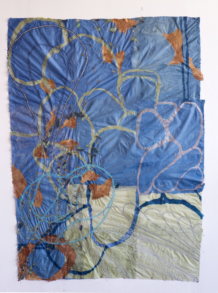 silver organic lines with brown leaf-like forms on a blue paper background
