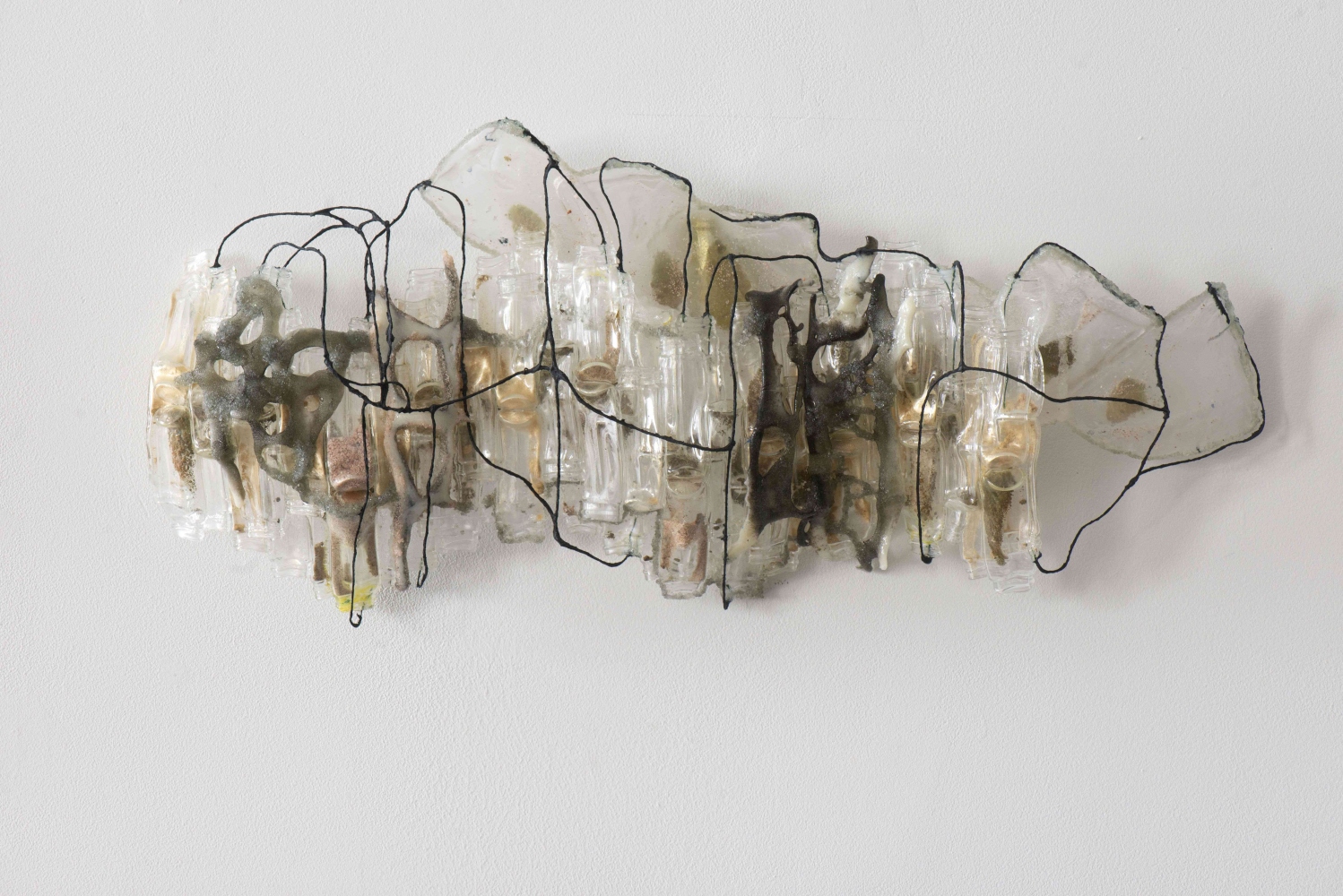 wall sculpture abstractly looks like a horizontal landscape