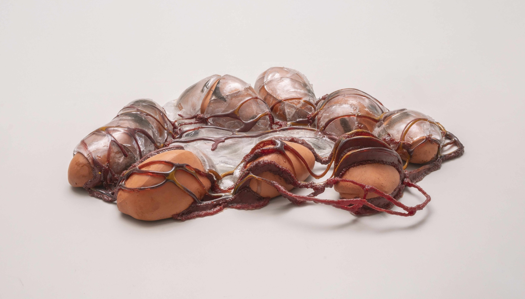 rock-like forms in clay and glass