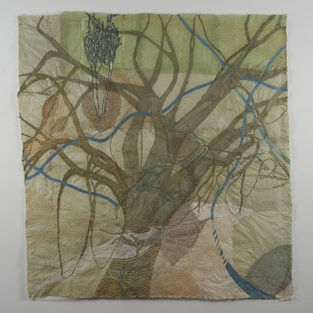 paper wall drawing with central tree image