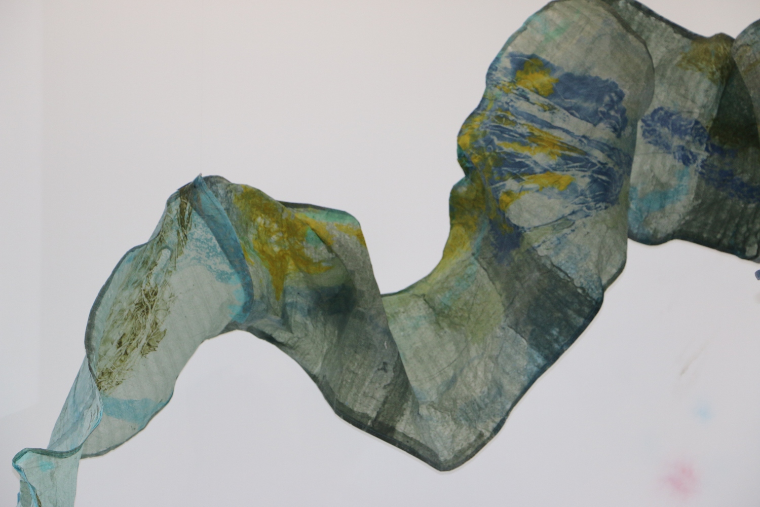 blue and green handmade paper wave form