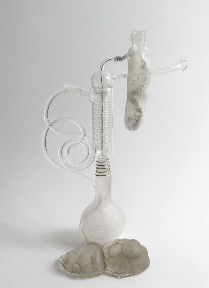 Glass pedestal sculpture that looks like some kind of musical horn