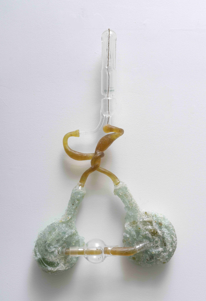 Glass wall sculpture that is abstract but feels like a system for breathing