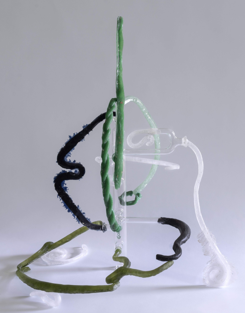 Glass sculpture with a central core and handles rotating off of it